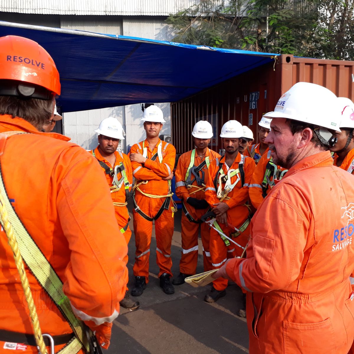 Resolve personnel attend a safety meeting in India.