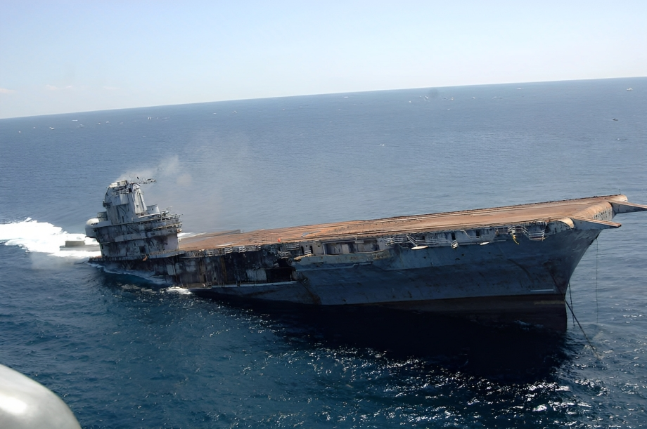 A large vessel sinks from her stern