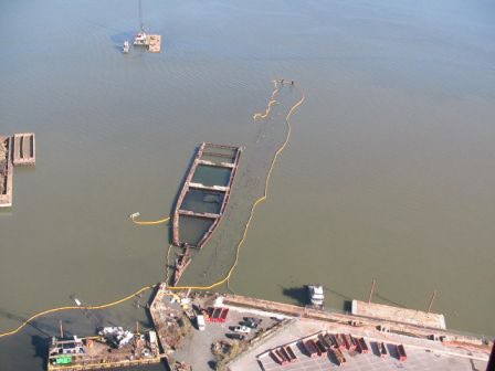 Aerial view of a half-sunken boat